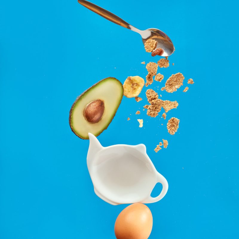 white ceramic mug with silver spoon