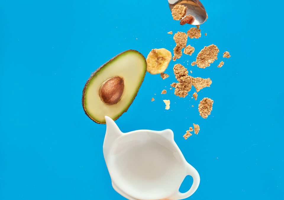 white ceramic mug with silver spoon